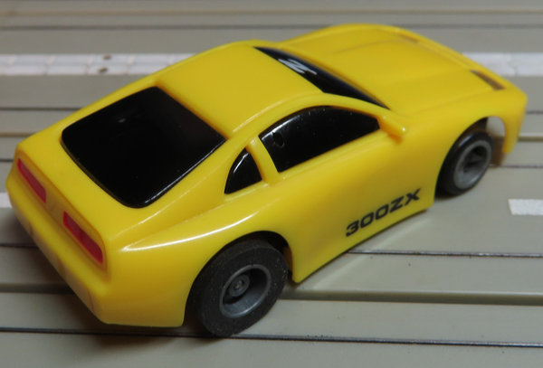 für H0 Slotcar Racing Modellbahn -- Nissan 300 ZX mit Tyco Motor und Fahrlicht #DEZ1558